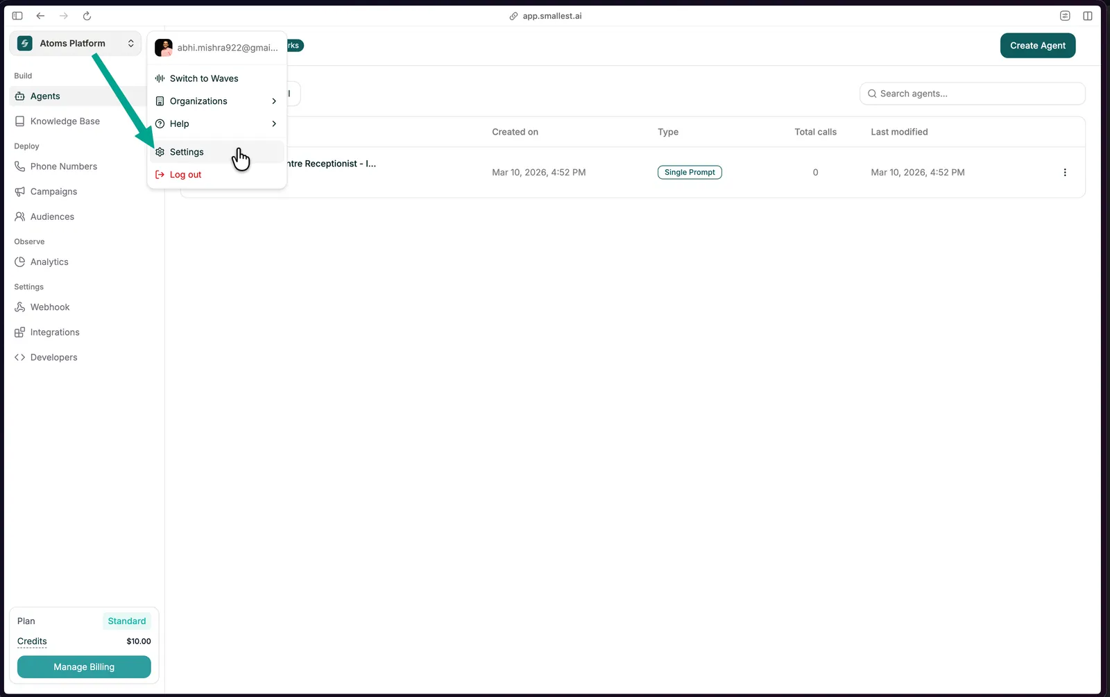 Atoms platform profile dropdown showing the Settings option in the left sidebar
