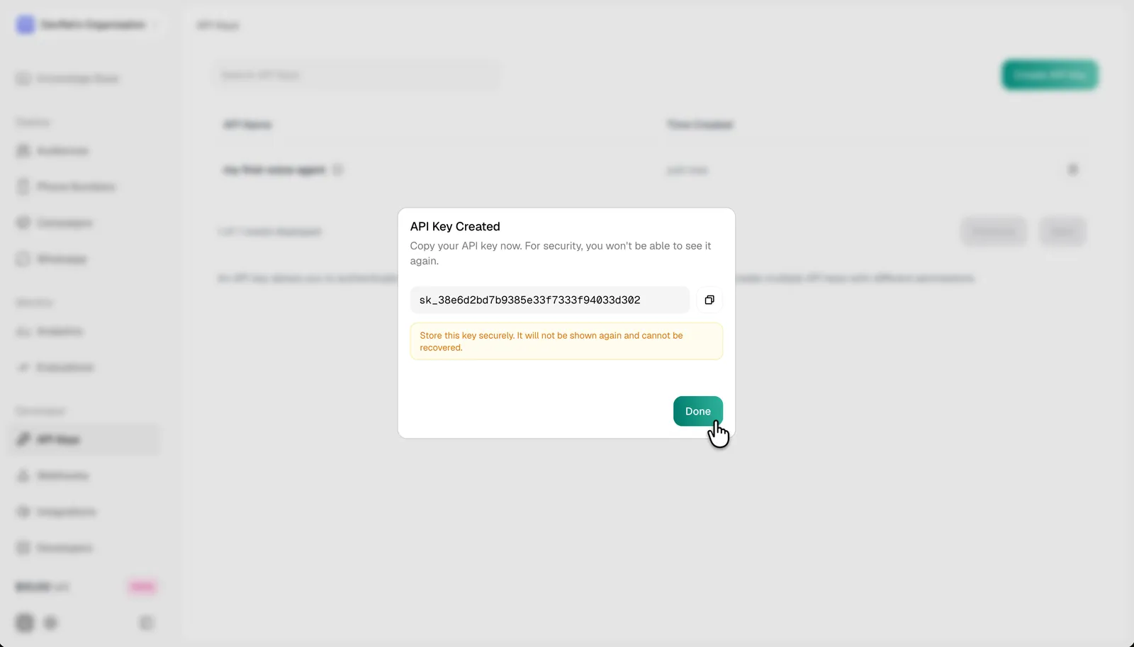 API Key Created dialog showing the generated key value and the Store this key securely warning